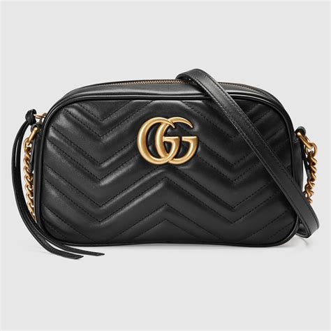 bolsa gucci de mao|Bolsa para el hombro pequeña GG Marmont .